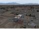 High angle view of a desert community with a wide expanse of land and scattered homes at 3080 S Prairie Ave, Pahrump, NV 89048
