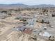 High angle view of a desert community with a wide expanse of land and scattered homes at 3080 S Prairie Ave, Pahrump, NV 89048