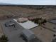 Expansive aerial view of a rural property showcasing desert landscape and spacious lot at 3080 S Prairie Ave, Pahrump, NV 89048