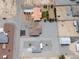 Overhead shot of houses with xeriscaped yards, surrounded by other homes in a desert neighborhood at 3080 S Prairie Ave, Pahrump, NV 89048
