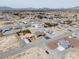 High angle view of a desert community with a wide expanse of land and scattered homes at 3080 S Prairie Ave, Pahrump, NV 89048