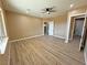 Large bedroom featuring wood-look floors and plenty of natural light at 3080 S Prairie Ave, Pahrump, NV 89048