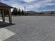Expansive front yard featuring low-maintenance desert landscaping, offering a clean and modern look at 3080 S Prairie Ave, Pahrump, NV 89048