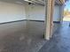A view of the sealed floor in a three-car garage at 3080 S Prairie Ave, Pahrump, NV 89048