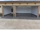 A view of the spacious three-car garage from the driveway at 3080 S Prairie Ave, Pahrump, NV 89048