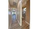 Hallway view showcasing the bathroom and bedrooms, enhancing the sense of space at 3080 S Prairie Ave, Pahrump, NV 89048