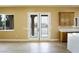 Open floor plan showing view of the outdoor patio and access to the kitchen at 3080 S Prairie Ave, Pahrump, NV 89048