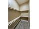 Functional walk-in closet with ample shelving for storage solutions at 3080 S Prairie Ave, Pahrump, NV 89048
