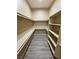 Organized walk-in closet featuring shelving and rod space for efficient storage at 3080 S Prairie Ave, Pahrump, NV 89048