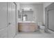 Bathroom featuring a double sink vanity, shower, and tiled floor at 3604 Lisandro St # 204, Las Vegas, NV 89108