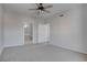 Bedroom features doorway to bathroom, closet, neutral carpeting, and ceiling fan at 3604 Lisandro St # 204, Las Vegas, NV 89108