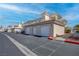 Exterior townhome garages on a sunny day at 3604 Lisandro St # 204, Las Vegas, NV 89108