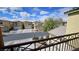 Balcony offers scenic neighborhood views, emphasizing the home's location with curb appeal and well maintained landscaping at 3634 Surfboard Ct, Las Vegas, NV 89147