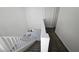 A modern staircase with white railings leads to the second floor, with access to hallway and bedrooms at 3634 Surfboard Ct, Las Vegas, NV 89147