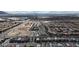 This aerial captures the neighborhood, nearby commercial areas, and developing spaces within the community at 4211 Enchanting Sky Ave, North Las Vegas, NV 89081