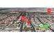 Extensive aerial view of community with location indicators showing proximity to Community Park and nearby streets at 4211 Enchanting Sky Ave, North Las Vegas, NV 89081