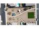 Aerial view showcases a well-maintained community park featuring walking paths, playgrounds, and green spaces at 4211 Enchanting Sky Ave, North Las Vegas, NV 89081