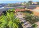 Backyard featuring a pergola, landscaping, and brick pathway at 4211 Enchanting Sky Ave, North Las Vegas, NV 89081