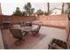 Spacious backyard featuring patio area, perfect for outdoor dining and entertaining with barbecue and outdoor furniture at 5032 Dancing Lights Ave, Las Vegas, NV 89130