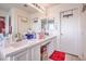 Bright bathroom with double sinks and a large counter at 5032 Dancing Lights Ave, Las Vegas, NV 89130