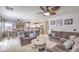 Open-concept living area flowing into the kitchen and dining, perfect for entertaining guests and Gathering at 5032 Dancing Lights Ave, Las Vegas, NV 89130