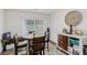 Bright dining area with wood floors, and a sliding glass door to the outdoors at 5615 Distelrath Ave, Las Vegas, NV 89122