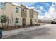 Modern two-story townhome with neutral stucco and xeriscaped landscaping at 5615 Distelrath Ave, Las Vegas, NV 89122