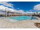 Community pool with mountain views on a sunny day at 5615 Distelrath Ave, Las Vegas, NV 89122