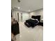This spacious bedroom has a dark-colored bed and large closet at 5812 Shangri La Night Ct, Las Vegas, NV 89149