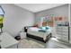 Light-filled bedroom with neutral paint and modern decor at 5812 Shangri La Night Ct, Las Vegas, NV 89149
