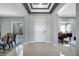 Open foyer with elegant tile flooring, high ceilings, and modern design at 5812 Shangri La Night Ct, Las Vegas, NV 89149