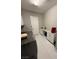 Well-organized laundry room with counter space, cabinetry, and modern washer/dryer at 5812 Shangri La Night Ct, Las Vegas, NV 89149