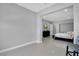 Open living area showcasing a bedroom and entertainment area at 5812 Shangri La Night Ct, Las Vegas, NV 89149