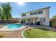 Great backyard featuring a pool and putting green for ultimate outdoor enjoyment at 6220 Silver Edge St, North Las Vegas, NV 89031