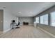 Expansive bonus room offering flexible space for a home office or entertainment area with modern design at 6220 Silver Edge St, North Las Vegas, NV 89031