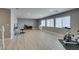 Bright bonus room features lots of natural light and versatile space for recreation or office at 6220 Silver Edge St, North Las Vegas, NV 89031
