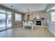 Bright dining room features sliding glass doors to the backyard and a cozy fireplace at 6220 Silver Edge St, North Las Vegas, NV 89031