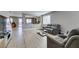 Cozy living room with tile floors and comfortable seating, creating an inviting atmosphere at 6220 Silver Edge St, North Las Vegas, NV 89031