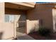 Private entrance with secured gate and tidy landscaping at 6700 Amarinta Ave # 104, Las Vegas, NV 89108