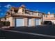 Charming townhome with two-car garage and well-maintained landscaping at 6700 Amarinta Ave # 104, Las Vegas, NV 89108