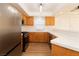 Updated kitchen with stainless steel appliances and generous counter space, perfect for cooking and gathering at 6700 Amarinta Ave # 104, Las Vegas, NV 89108