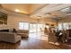 A beautiful living room with a dining area, fireplace, and lots of natural light at 6700 Amarinta Ave # 104, Las Vegas, NV 89108