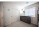 Bedroom with gray dresser, carpet flooring, closet, and bunk beds at 6913 Evening Orchid St, North Las Vegas, NV 89086