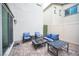 Private patio features outdoor seating with a fire pit, ideal for relaxing and entertaining at 6913 Evening Orchid St, North Las Vegas, NV 89086