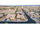 Street view of a home featuring solar panels, desert landscaping, and a circular driveway in a residential neighborhood at 7682 Rafter Ct, Las Vegas, NV 89139