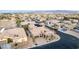 Exterior of a home with solar panels, low-maintenance landscaping, and a spacious driveway in a planned community at 7682 Rafter Ct, Las Vegas, NV 89139