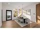 Bright dining room with modern chandelier and elegant decor at 7682 Rafter Ct, Las Vegas, NV 89139