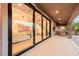 Sliding glass doors open to an expansive patio and backyard, seamlessly connecting indoor and outdoor living spaces at 7682 Rafter Ct, Las Vegas, NV 89139
