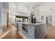 Spacious kitchen with a large island and open floor plan at 7682 Rafter Ct, Las Vegas, NV 89139