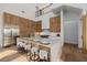 Spacious kitchen with a large island and a breakfast bar at 7682 Rafter Ct, Las Vegas, NV 89139